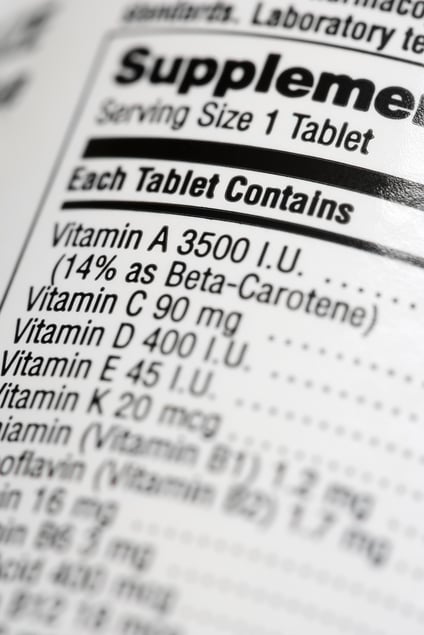 Supplement Facts label on a bottle of dietary supplements that shows ingredients and other information.